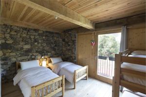 Mas rural El Negre客房内的一张或多张床位