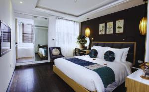 Hotel Emerald Waters Classy客房内的一张或多张床位