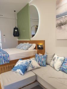 Vista Al Mare Luxury Apartments客房内的一张或多张床位