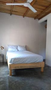 Casa de Kai Mazunte客房内的一张或多张床位