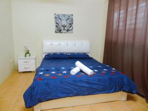 Dream Borneo Budget Homestay Kota Kinabalu客房内的一张或多张床位