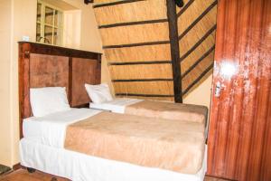 Mapelepele Cottage客房内的一张或多张床位