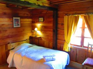 Hotel Antigua Casona Patagonia客房内的一张或多张床位