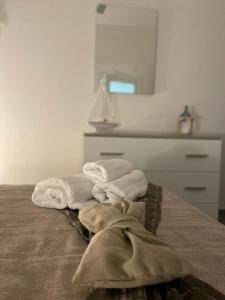 锡拉库扎La Pietra di Giada的床上的一大堆毛巾