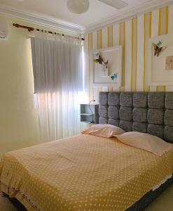 Espectacular y Acogedor客房内的一张或多张床位