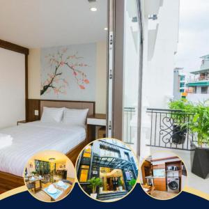 河内HANA Stay的酒店客房设有一张床和一个阳台。