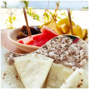 古雷德胡La Isla Tropica的一小盘带水果的食品和一碗浸水