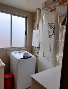 Apê aconchegante e quentinho em São Joaquim的一间浴室