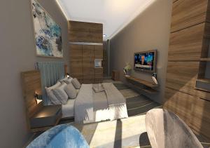 埃尔比勒凡皇家酒店的一间卧室配有一张床和一台电视