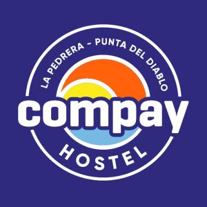 拉佩德雷拉Compay Hostel La Pedrera的代理旅馆标志