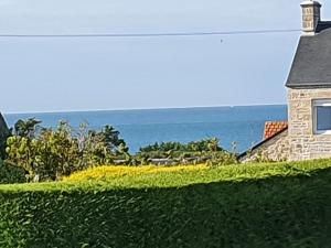 Gatteville-le-PhareLe relais du phare的背景中海洋之家的形象
