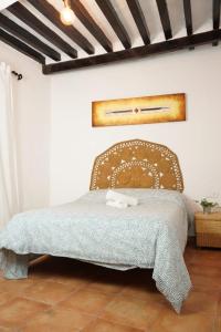 贝瑙卡斯Mascotas 2的卧室配有一张床