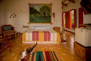Hacienda El Samán客房内的一张或多张床位