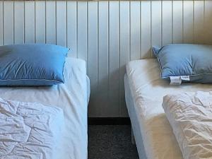 Three-Bedroom Holiday home in Otterup 9客房内的一张或多张床位