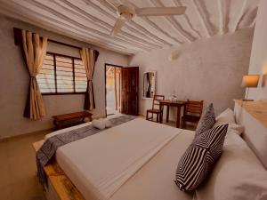 吉汶瓦White Dream的卧室配有一张白色大床