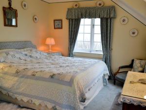 白玫瑰乡村别墅客房内的一张或多张床位