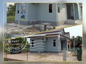 巴佐NQ Jelawat HOMESTAY的一张有标志的小房子的两张照片
