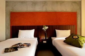 魅力精品度假酒店客房内的一张或多张床位