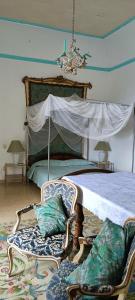Palazzo Caracciolo客房内的一张或多张床位