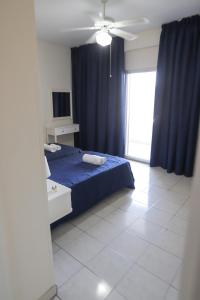 Larnaca Center Apartments客房内的一张或多张床位
