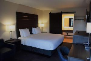 圣罗莎旅游宾馆客房内的一张或多张床位