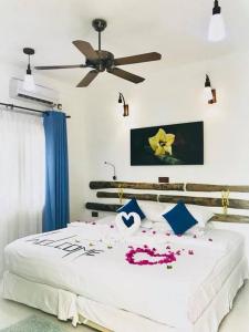 Rangali Etos Guraidhoo客房内的一张或多张床位