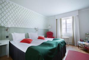 罗纳姆海加尔德酒店客房内的一张或多张床位