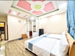 Hotel Nắng客房内的一张或多张床位