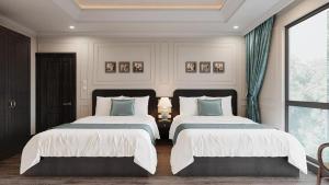Đại Thủy Hotel CatBa客房内的一张或多张床位