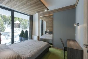 Apparthotel Silbersee客房内的一张或多张床位
