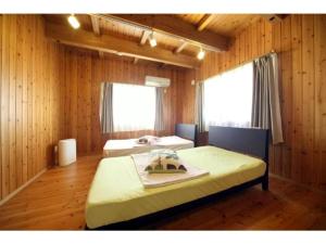 Nakijin Hope Hills Raku - Vacation STAY 13480v客房内的一张或多张床位