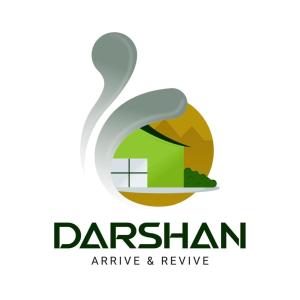 库斯哈尔纳加尔Darshan Arrive & Revive Homestay.的圆环标志的房子