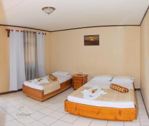 Hotel Geliwa客房内的一张或多张床位