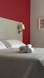 贝尔索吉欧诺酒店客房内的一张或多张床位