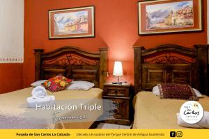 Posada de San Carlos La Calzada客房内的一张或多张床位