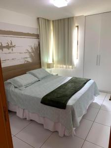 拉巴拉德纳圣米格尔ILOA Condomínio Resort Barra de São Miguel的卧室配有一张床