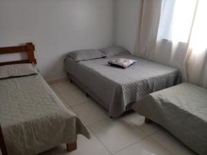 Casa da Thalita客房内的一张或多张床位