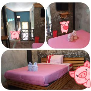 Ban Huai PhaiThe Ozone station的配有一张粉红色床罩的房间