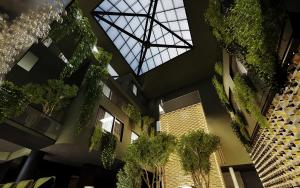 卑尔根Magic Hotel & Apartments Kløverhuset的一座挂在天花板上的植物建筑