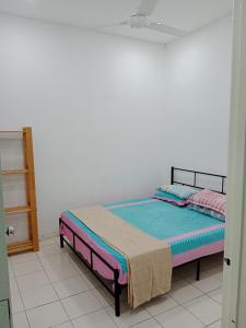 Homestay Desa Manjung Point, 437客房内的一张或多张床位