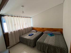 Pousada Ilha Sul客房内的一张或多张床位