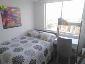 Habitación privada cómoda vista Bogotá客房内的一张或多张床位