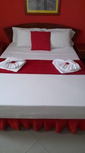 Royal Mindelo Suite客房内的一张或多张床位