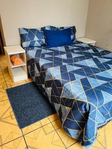 Izinjiki Namacusi Guest House客房内的一张或多张床位