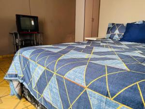 Izinjiki Namacusi Guest House客房内的一张或多张床位
