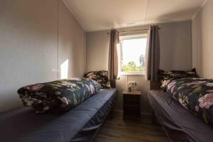 6-persoons chalet in Voorthuizen op de Veluwe客房内的一张或多张床位