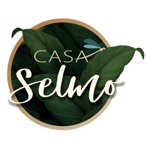 CarrenoCasa Rural Casa Selmo的绿叶圆环,带"casa seilia"字