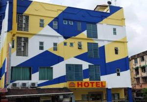 蕉赖蕉赖太阳之星酒店 - 巴拉孔的一面画的酒店