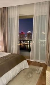 Beachfront Luxury Apartment-Pearl Island شقه مطله على الشاطئ بجزيرة اللؤلؤه