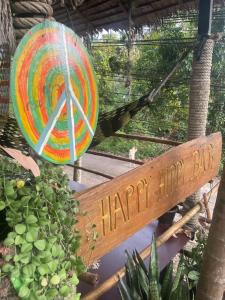 象岛Happy Hippy House2的一个快乐的小倾角标志和一个多彩的目标
